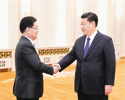 3月12日，国家主席习近平在北京人民大会堂会见韩国总统特使、国家安保室长郑义溶。新华社记者 庞兴雷摄
