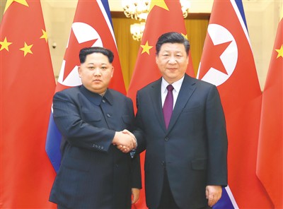 “习金会”惊了世界暖了春天