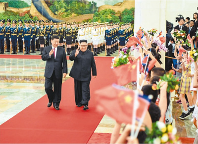 6月19日，中共中央总书记、国家主席习近平同当日抵京对中国进行访问的朝鲜劳动党委员长、国务委员会委员长金正恩举行会谈。这是会谈前，习近平总书记在北京人民大会堂北大厅为金正恩委员长举行欢迎仪式。新华社记者 申 宏摄